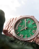 A dial in green aventurine, an ornamental stone with a delicately crystallized surface. Cut from a block of raw material, only stone discs whose color and structure fully meet @Rolex's highly selective aesthetic criteria are selected. Expert skills – selection, polishing, and gem-setting – and meticulous craftsmanship have created an exclusive dial that will adorn the Day-Date 36 and give it a unique personality.#Rolex #DayDate #OfficialRolexRetailer #GodechotPauliet